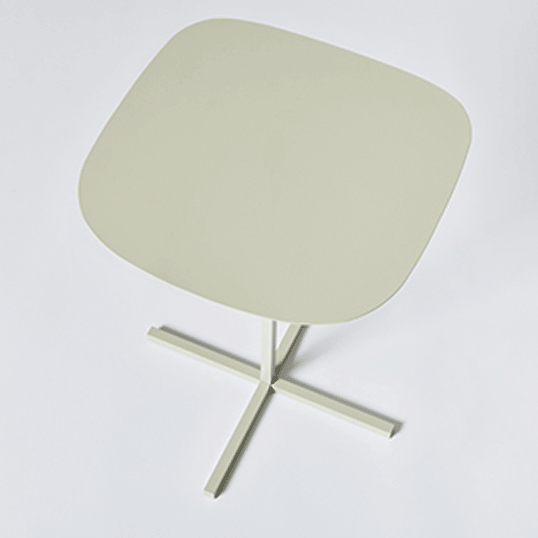 DUENDE SOLID STEEL TABLE BEIGE十字にクロスした重厚感のあるベース角のアール率が微妙に異なる緩急のついた天板が特徴的なサイドテーブルスチール無垢材ならではの力学から生まれた構造おおらかな輪郭の天板リビング インテリア送料無料 2