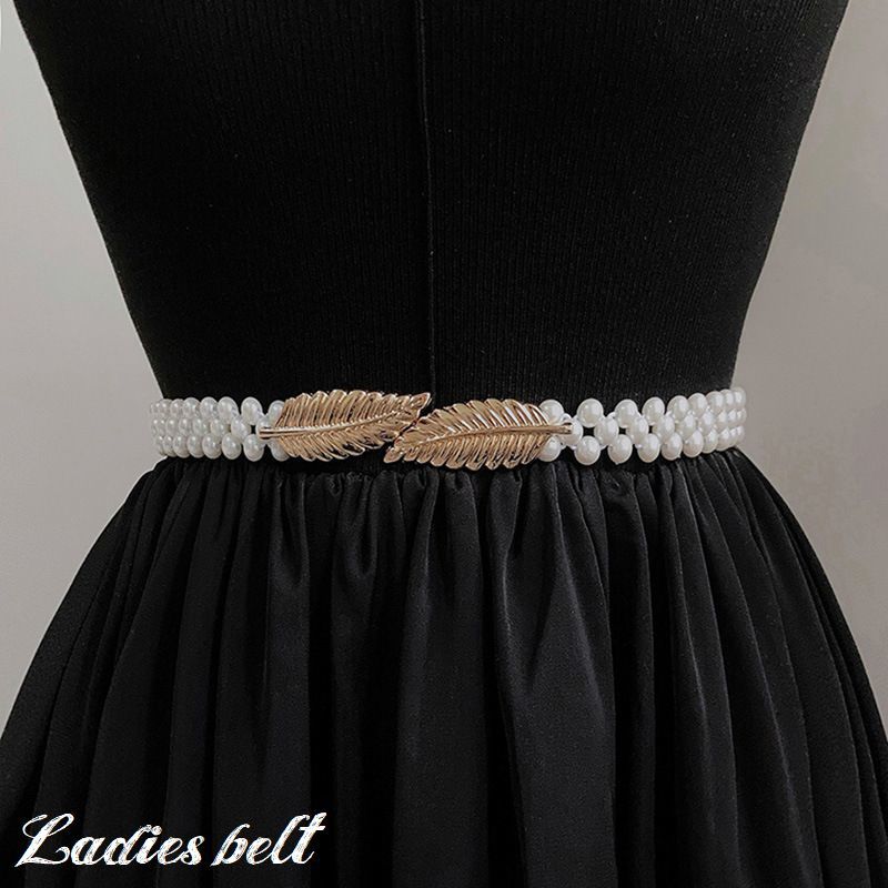 Free shipping! Fashion belt for women. A stylish and elegant belt with a leaf design, rhinestone embellishments, and pearl-like accents. Perfect for adding a touch of sophistication and cuteness.