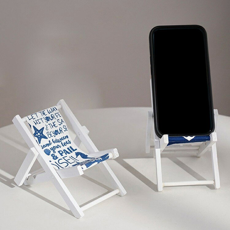送料無料 スマホスタンド スマホホルダー スマホ置き スマホ関連雑貨 スマホ周辺雑貨 インテリア小物 イス型 チェア型 折り畳み可能 総柄 ストライプ フラミンゴ イカリ マリンモチーフ 海モチーフ ブルー ホワイト ロゴ 英語 可愛い キュート おしゃれの商品画像 3