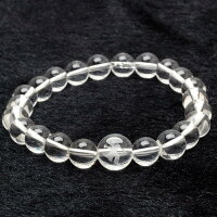 天然水晶へ手彫りで薬師如来の梵字を施しています。