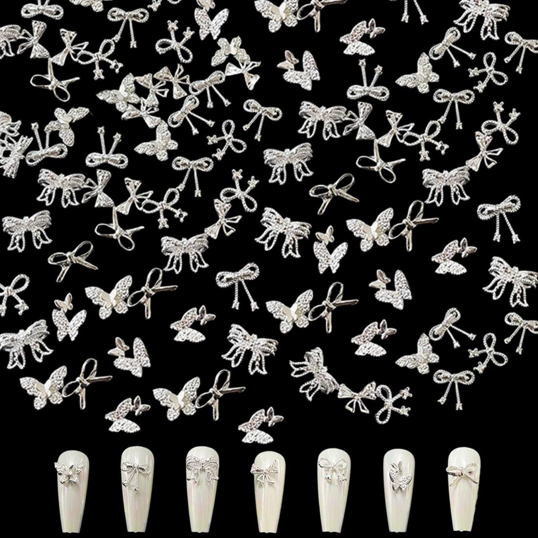 ネイルパーツ リボン 蝶々 50個セット 3D 立体 ネイル リボン パーツ 可愛い 大きい 蝶結び リボン メタルパーツ ネイルアート ジュエリーパーツ 手芸 デコパーツ (シルバー)