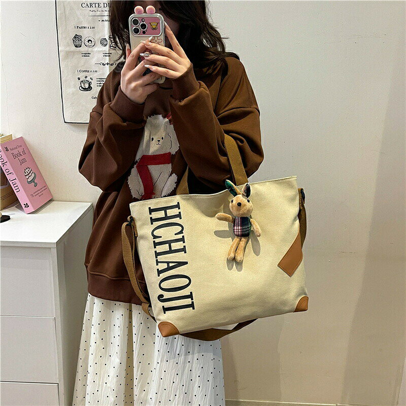 樂天商城 - ワンショルダー キャンバストートバッグ 大容量 メッセンジャーバッグ 通勤 通学 ママバッグ カジュアル鞄 男女兼用 旅行バッグ
