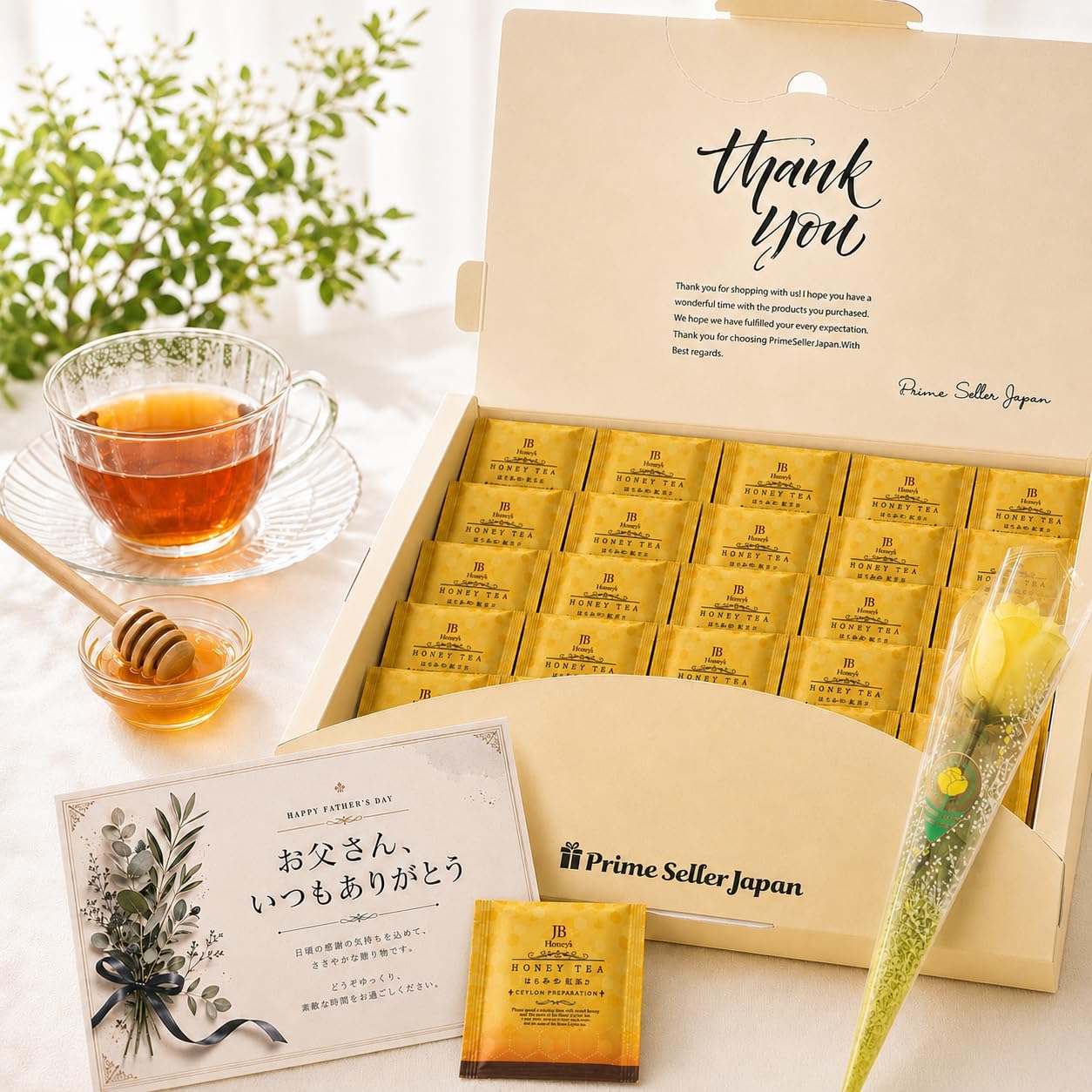 父の日ギフト はちみつ紅茶 30袋 ギフトボックス メッセージカード 花付き ティーバッグ 個包装 詰め合わせ プレゼントブランド：JB Honeys父の日の贈り物に、やさしい甘みと上品な香りを楽しめるはちみつ紅茶30袋入りギフトセットです。メッセージカードと黄色いお花(造花)付きなので、感謝の気持ちを添えてそのまま渡しやすい内容です。 紅茶にはちみつパウダーを合わせたティーバッグタイプで、お湯を注ぐだけで手軽に一杯を用意できます。やわらかな甘みがあるため、砂糖を用意しなくても飲みやすく、休憩時間や食後のティータイムにも取り入れやすい紅茶です。 個包装仕様のため、保管しやすく、飲みたい時に使いやすいのも魅力です。ホットはもちろん、アイスティーとしても楽しめるため、季節や気分に合わせて飲み方を選べます。 ギフトボックス入りで、父の日、お礼、季節のご挨拶、紅茶好きな方へのプレゼントに。直射日光・高温多湿を避けて保存し、開封後は密封して保管してください。 [賞味期限] 出荷日より30日以上の商品をお届けいたします。 父の日の贈り物に使いやすい、はちみつ紅茶30袋入りギフトセットです。メッセージカードと黄色いお花（造花）付きで感謝を伝えやすい内容 ・はちみつの自然な甘みが広がる贅沢な味わい 粉末状のはちみつパウダーをブレンドし、砂糖を加えなくてもやさしい甘みを感じられる紅茶。セイロン紅茶の香りと絶妙に調和した一杯です。 ・スリランカ産ディンブラ茶葉を使用した本格紅茶 スリランカ・ディンブラ地方産のセイロン茶葉を使用し、香ばしく豊かな風味が特徴。紅茶好きの方へのギフトにも適しています。 ・ティーバッグ＆個包装で手軽に楽しめる ティーバッグタイプで簡単に淹れられ、個包装で使いやすく衛生的。ご自宅やオフィス、来客時のティータイムにも便利です。 ・ホットでもアイスでも楽しめる紅茶 ホットはもちろん、濃いめに抽出してアイスティーとしても美味しく楽しめます。季節を問わずリラックスタイムにおすすめです。 ・父の日に嬉しいギフト仕様 メッセージカードと黄色いお花（造花）付きで、そのまま渡せる父の日ギフト。特別な準備をしなくても気持ちを伝えられます。項目内容ブランド名JB Honeys内容量 / 重量30袋原産国スリランカ商品タイプティーバッグ■ 商品の特徴 父の日の贈り物に使いやすい、はちみつ紅茶30袋入りギフトセットです。メッセージカードと黄色いお花（造花）付きで感謝を伝えやすい内容 ・はちみつの自然な甘みが広がる贅沢な味わい 粉末状のはちみつパウダーをブレンドし、砂糖を加えなくてもやさしい甘みを感じられる紅茶。セイロン紅茶の香りと絶妙に調和した一杯です。 ・スリランカ産ディンブラ茶葉を使用した本格紅茶 スリランカ・ディンブラ地方産のセイロン茶葉を使用し、香ばしく豊かな風味が特徴。紅茶好きの方へのギフトにも適しています。 ・ティーバッグ＆個包装で手軽に楽しめる ティーバッグタイプで簡単に淹れられ、個包装で使いやすく衛生的。ご自宅やオフィス、来客時のティータイムにも便利です。 ・ホットでもアイスでも楽しめる紅茶 ホットはもちろん、濃いめに抽出してアイスティーとしても美味しく楽しめます。季節を問わずリラックスタイムにおすすめです。 ・父の日に嬉しいギフト仕様 メッセージカードと黄色いお花（造花）付きで、そのまま渡せる父の日ギフト。特別な準備をしなくても気持ちを伝えられます。■ ご注意事項 予告なくパッケージや内容量が変更される場合がございます。 画像はイメージです。実際の商品と一部異なる場合がございます。 食品のため、お客様のご都合による返品・交換はお断りしております。 商品到着後はお早めにお召し上がりください。関連商品お中元ギフト はちみつ紅茶 はちみつティー 30袋 ギフトボックス 熨...母の日ギフト はちみつ紅茶 はちみつティー ティーバッグ 30袋 個包...1,600円1,600円jb はちみつ紅茶 はちみつティー ギフト ティーバッグ 蜂蜜紅茶 J...はちみつ紅茶 はちみつティー ミントティー ティーバッグ JB Hon...1,380円1,380円ルイボスティー ティーバッグ jb はちみつ紅茶 はちみつティー ティ...はちみつ紅茶 はちみつティー JB honey tea ティーバッグ ...1,380円1,890円レモンティー フルーツティー ティーバッグ サニーレモン 1.5gx1...イングリッシュブレックファースト ティーバッグ 2gx100包 JAF...1,790円1,790円はちみつ紅茶 はちみつティー ミントティー ティーバッグ jb ノンカ...アールグレイ ティーバッグ JAF TEA 紅茶 2gx100包 セイ...1,890円1,790円父の日ギフト はちみつ紅茶 30袋 ギフトボックス メッセージカード 花付き ティーバッグ 個包装 詰め合わせ プレゼント 父の日の贈り物に使いやすい、はちみつ紅茶30袋入りギフトセットです。メッセージカードと黄色いお花（造花）付きで感謝を伝えやすい内容・はちみつの自然な甘みが広がる贅沢な味わい 粉末状のはちみつパウダーをブレンドし、砂糖を加えなくてもやさしい甘みを感じられる紅茶。セイロン紅茶の香りと絶妙に調和した一杯です。・スリランカ産ディンブラ茶葉を使用した本格紅茶 スリランカ・ディンブラ地方産のセイロン茶葉を使用し、香ばしく豊かな風味が特徴。紅茶好きの方へのギフトにも適しています。 ※パッケージ・内容量は予告なく変更になる場合があります。