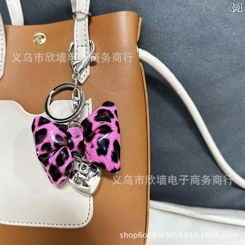 キーホルダー レディース バッグチャーム ヒョウ柄 リボン フェイクレザー キーリ...