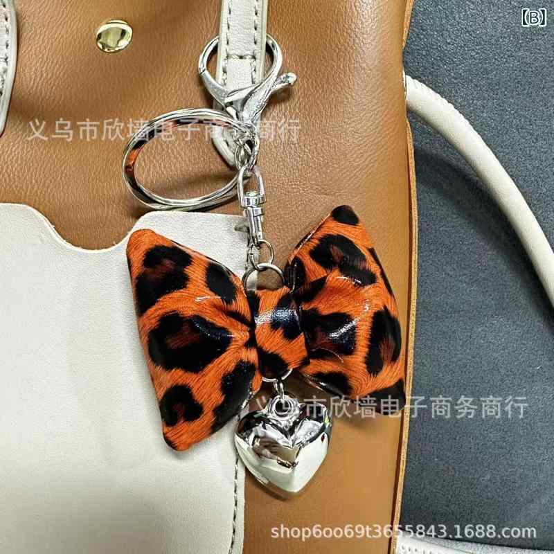 キーホルダー レディース バッグチャーム ヒョウ柄 リボン フェイクレザー キーリ...