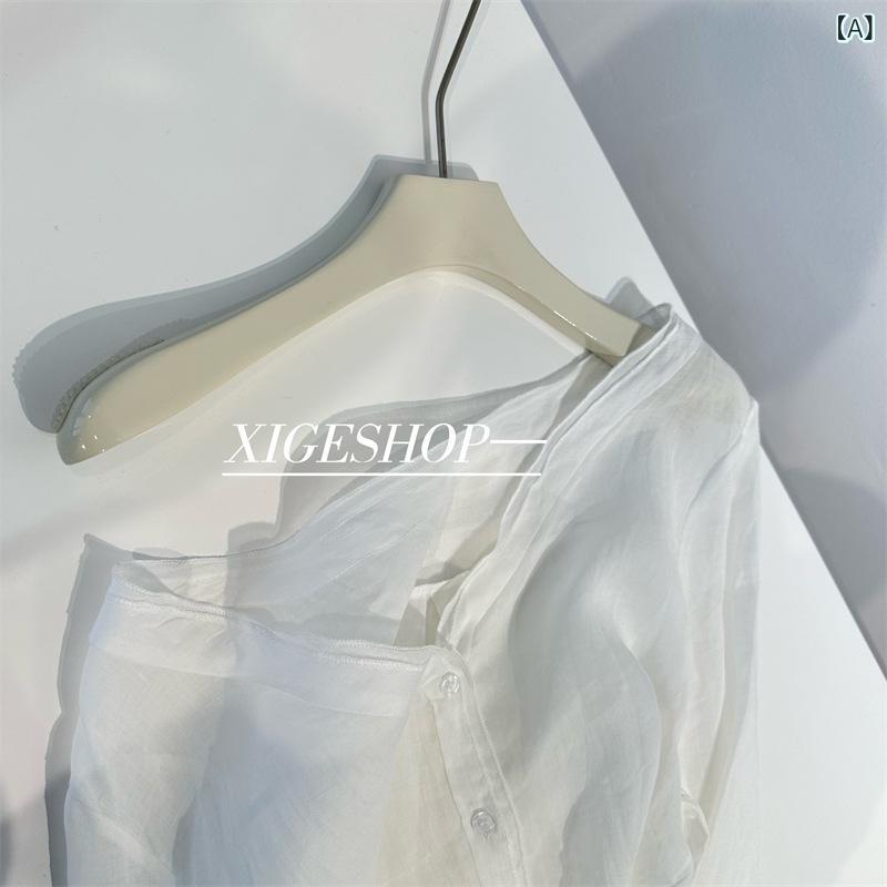 ・カテゴリ: 衬衫・素材: 氨纶30%以下・柄: 纯色・袖丈: 长袖・シルエット: 宽松型・ネックライン: V领・袖型: 衬衫袖・カラー展開: 白色、藏青色・サイズ展開: M、L・スタイル: 御姐风