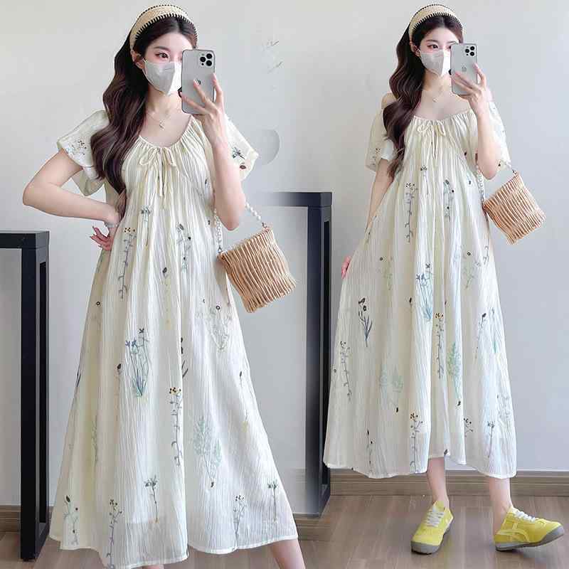 ワンピース マタニティ レディース 春夏 ゆったり 妊婦服 刺繍 花柄 大きいサイズ 韓国風 フェミニン 体型カバー ママ 産前 産後 カジュアル デイリー きれいめ・カテゴリ: ワンピース・ネックライン: クルーネック・袖丈: 五分袖・主な素材: 綿、ポリエステル・素材混率: 綿30%以下・柄: 花柄・スカート丈: ミモレ丈・カラー展開: 画像色・サイズ展開: M,L,XL,2XL・スカートタイプ: フェアリースカート・スタイル: フレッシュ＆スイート・流行の要素: リボン・袖のタイプ: パフスリーブ・工芸: 先染め・その他素材: スパンデックス・その他素材混率: スパンデックス30%以下