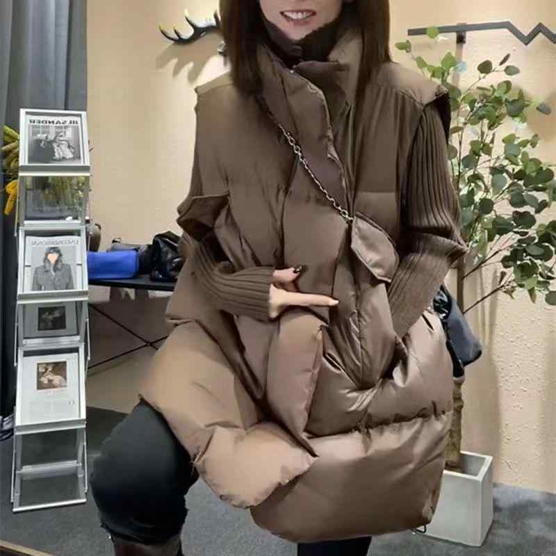 ・スタイル: コンミューター、都会風・ネックライン: ホルターネック・デザイン: チェーン・主な素材: ポリエステル100%・カラー展開: ブラックロングベスト、ブラウンロングベスト、ワインレッドロングベスト・サイズ展開: M（57.5kg以下）、L（57.5-65kg）、XL（65-72.5kg）、2XL（72.5-80kg）・対象: 成人女性・カテゴリ: ベスト、タンクトップ
