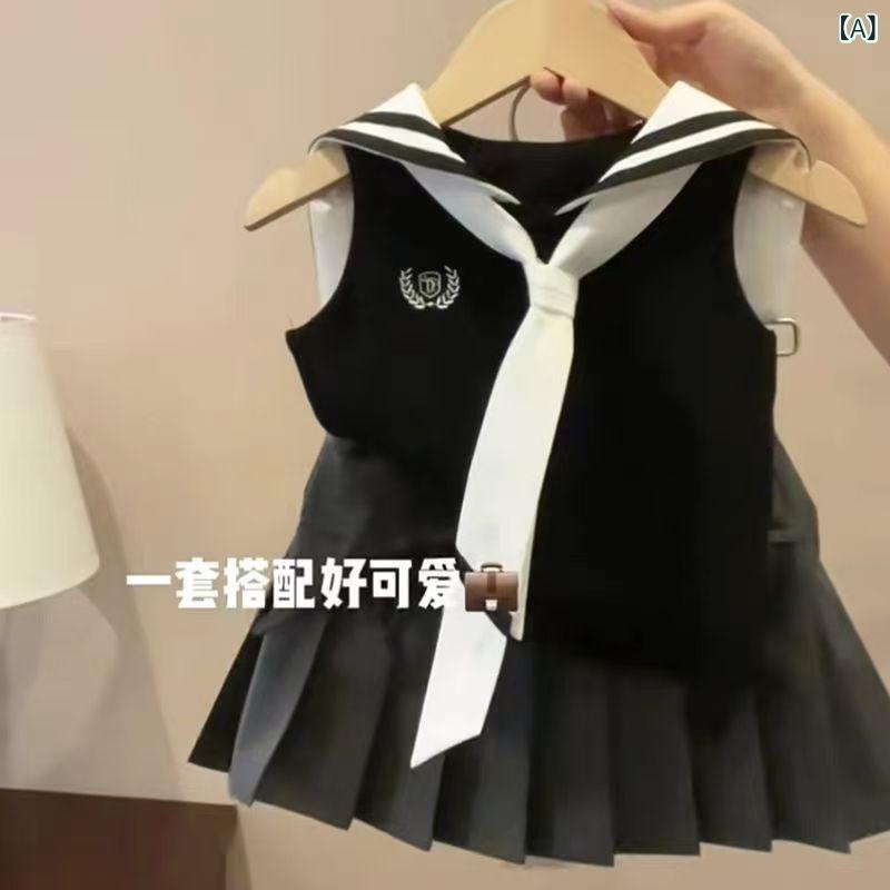 ・カテゴリ: 子供服セット・スタイル: 韓国風・セット内容: スカートセット（2点セット）・対象性別: 女の子・対象年齢: 中小童（3〜8歳、100〜140cm）・袖丈: ノースリーブ・生地加工: 柔軟処理・生地の厚さ: 薄手・素材: 綿混紡（綿80%）・開閉様式: プルオーバー・カラー展開: ネイビー襟ベスト＋グレープリーツスカート・サイズ展開: 80cm、90cm、100cm、110cm、120cm、130cm、140cm