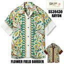 通販 サンサーフ 抽象的に描かれた南国の草花が強烈なインパクトを放つ一枚。前身頃にボーダー・パターンができるようにモチーフがレイアウトされている。