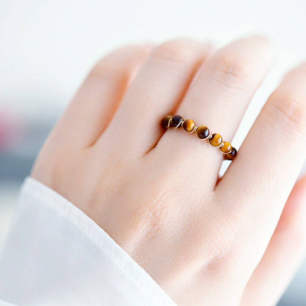 繁栄と富を象徴するタイガーアイの手...