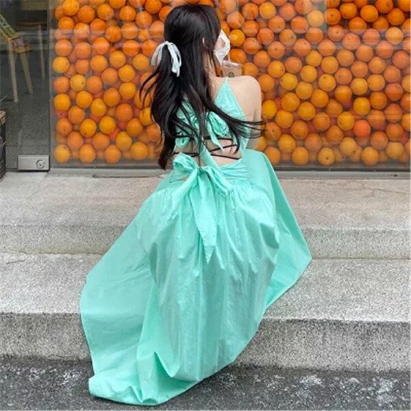 デザイン ニッチ Vネック 背透けて 袖なし 蝶結び リバーシブル サスペンダー ワンピース