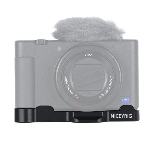 Sony ZV-1にデザインされ、底部の1/4インチネジ穴を利用して様々なアクセサリーを装着できます。使用中、カメラ一切のボタン使いや、電池ドア開閉に全然影響無しプロやアマチュアを問わず、カメラマンのための最適な機材です。 底部のコールドシューデザイン、マイクとLEDライトを取り付けることができます。Arca規格プレートや1/4"-20のネジ穴を通じて、三脚や他の機材などを直接に取り付ける可能です。 底部にゴムクッションがあるの脱落防止できるから、カメラを擦り傷などから守り、安定性も高いです。 側面と底部には1/4-20ネジ穴があり、異なる三脚を取り付けることができます。横撮りと縦撮りの自由な切り替えを実現します。 取り付けの方法:Step 1. カメラの底部のネジ穴に1/4六角穴付止めネジを取り付けます。 Step 2. ベースプレート底部にはM3(6mm)皿ネジでカメラの1/4六角穴付止めネジに取り付けてください。