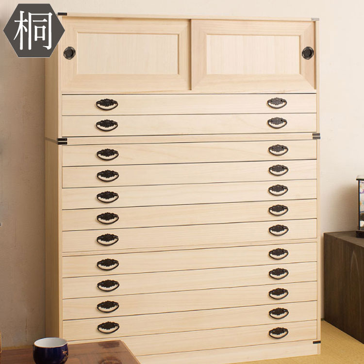 ■商品について/上置き用の桐たんすをプラスしたお得なセット ■商品の仕様/本体:天然木(桐材)その他:天然木桐化粧板■本体/10段(約)幅99.5×奥行44×高さ84cm 上置:(約)幅99.5×奥行44×高さ45cm(奥行は取っ手を含んでおりません。取っ手を含むと2~3cmほど長くなります)■本体/10段(約)幅99.5×奥行44×高さ84cm 上置:(約)幅99.5×奥行44×高さ45cm(奥行は取っ手を含んでおりません。取っ手を含むと2~3cmほど長くなります)■日本製■完成品 ※仕様変更点はページ内でご確認下さい。【重要】個人宅配のトラブル防止のため運送会社からは今後、お客様にお手伝いをしていただく事を禁止とし、その際玄関が階段を使って上る・エレベーターなしの2階以上のお宅は別途、 追加料金が発生します（玄関渡しが原則です）家具の配送のトラブル防止の為、運送会社の取り決めになりましたのでご了承お願いいたします。【代引きについて】こちらの商品は、代引きでの出荷は受け付けておりません。【送料について】北海道、東北、沖縄、離島は送料を頂きます。桐タンス引戸引出2杯引出3杯2段+3段チェスト2段+10段チェスト2段+深型3段チェスト2段+深型6段チェスト3段+3段チェスト3段+10段チェスト3段+深型3段チェスト3段+深型6段チェスト