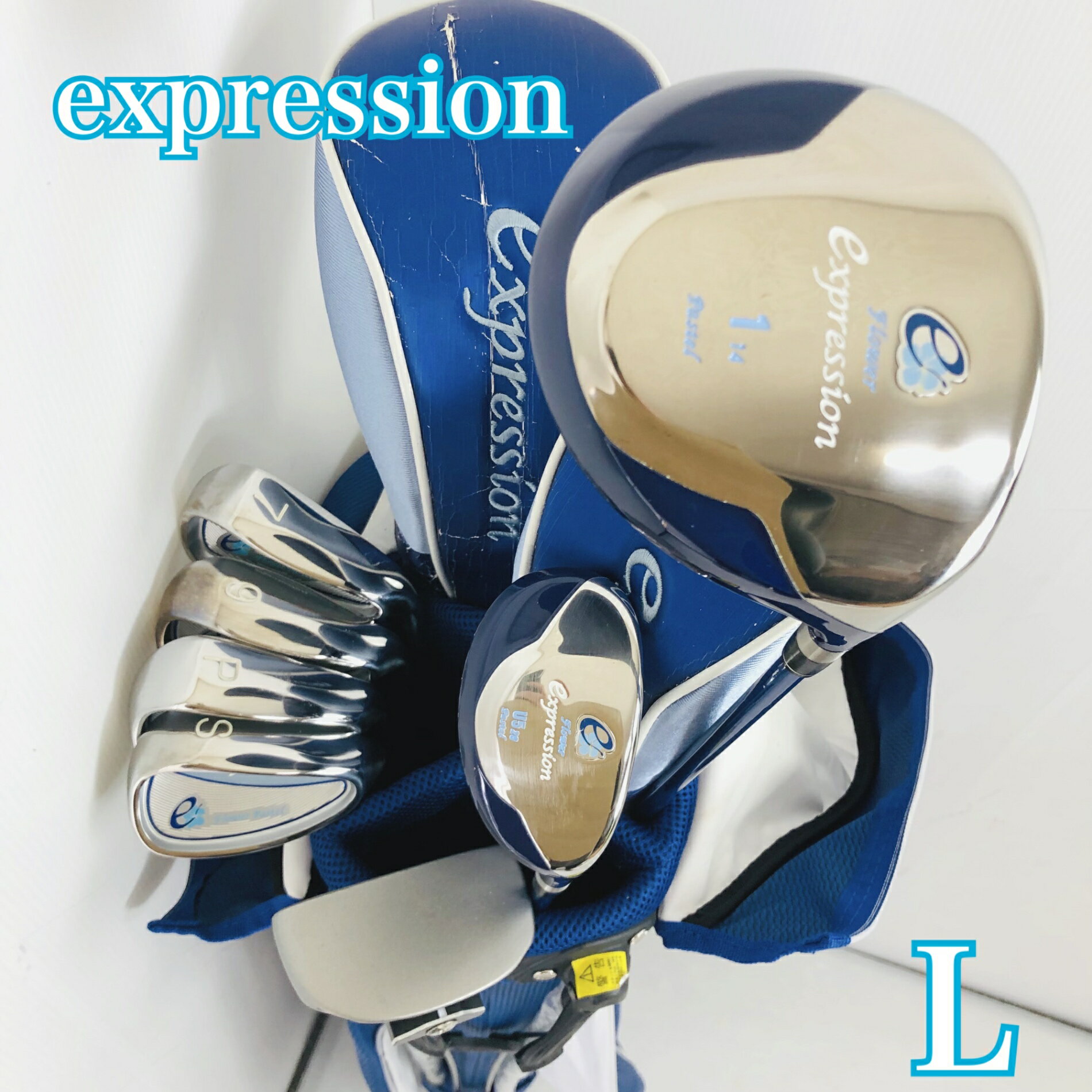クラブはクリーニング済 レディース初心者向けセット パター付き ●メーカー expression エクスプレッション ●モデル Flower フラワー 番手：1W、5U、7.9I、PW、SW、PT 計7本 硬さ/フレックス:L 性別:女性 レディース 利き腕：右利き ・キャディバッグ メーカー: MIZUNO ミズノ スタンドタイプ 中古品ですので傷汚れはこざいますが、まだまだお使いいただけます。 ヘッドカバー2つ付属 劣化しております。 ※画像にある物が全てです。 ●状態 通常使用に伴うスレ、傷はございますが、まだまだお使いいただけます。 グリップはそのままお使いいただけますがが気になるようでしたら交換してお使いください。 簡易クリーニング済み ※あくまでUsed品になりますので細かな傷、汚れはございます。画像にてご確認ください。 ★確認必須事項★ ※商品状態の感じ方には個人差がありますので、“中古品”という事をご理解いただき、神経質な方のご購入はご遠慮ください。 ※基本発送日は月、水、金曜日になります。 祝日等でイレギュラーが発生することもございます。 83Y-63-00001