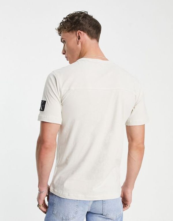 カルバンクライン メンズ Tシャツ トップス Calvin Klein Jeans monogram badge t-shirt in stone Stone