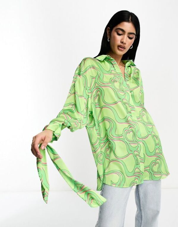 yz GC\X fB[X Vc gbvX ASOS DESIGN oversized satin shirt with tie cuff detail in green heart print Heart print