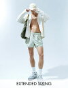  エイソス メンズ ハーフパンツ・ショーツ 水着 ASOS DESIGN swim shorts in short length with camo print in khaki Light khaki