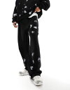 【送料無料】 コルージョン メンズ カジュアルパンツ ボトムス COLLUSION relaxed sweatpants with hand paint spray in black - part of a set Black