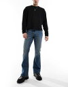 【送料無料】 エイソス メンズ デニムパンツ ボトムス ASOS DESIGN stretch flare jeans in mid wash blue Mid...