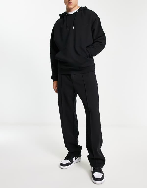 【送料無料】 ウィークデイ メンズ カジュアルパンツ スウェットパンツ ボトムス Weekday ken straight leg sweatpants in black Black