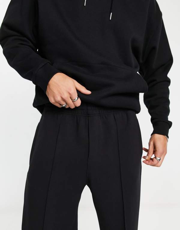 【送料無料】 ウィークデイ メンズ カジュアルパンツ スウェットパンツ ボトムス Weekday ken straight leg sweatpants in black Black