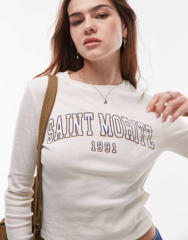 トップショップ レディース トップス Tシャツ グラフィック Topshop graphic Saint Moritz long sleeve baby tee IVORY アイボリー