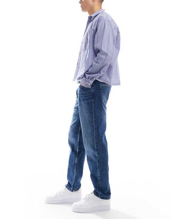 【送料無料】 ベルシュカ メンズ デニムパンツ ボトムス Bershka straight vintage fit jeans in denim blue Dark blue