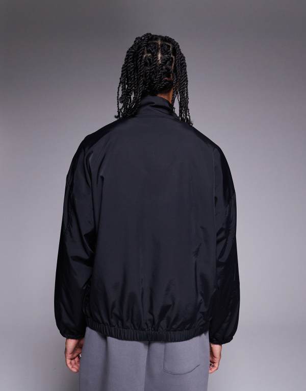 【送料無料】 エイソス メンズ ジャケット・ブルゾン アウター ASOS DESIGN oversized track jacket in black with contrast piping Black