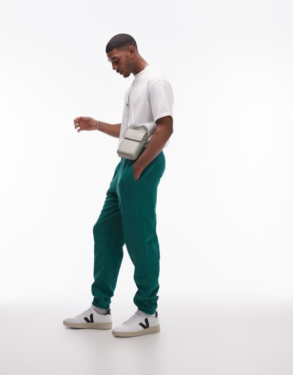 【送料無料】 トップマン メンズ カジュアルパンツ ボトムス Topman washed oversized sweatpants in green Washed green