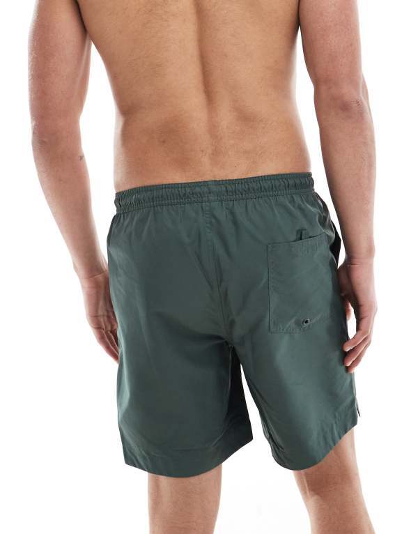【送料無料】 フレッドペリー メンズ ハーフパンツ・ショーツ 水着 Fred Perry swim shorts in dark green Green