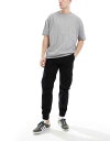 【送料無料】 ベルシュカ メンズ カジュアルパンツ ボトムス Bershka cuffed cargo pants in black Black