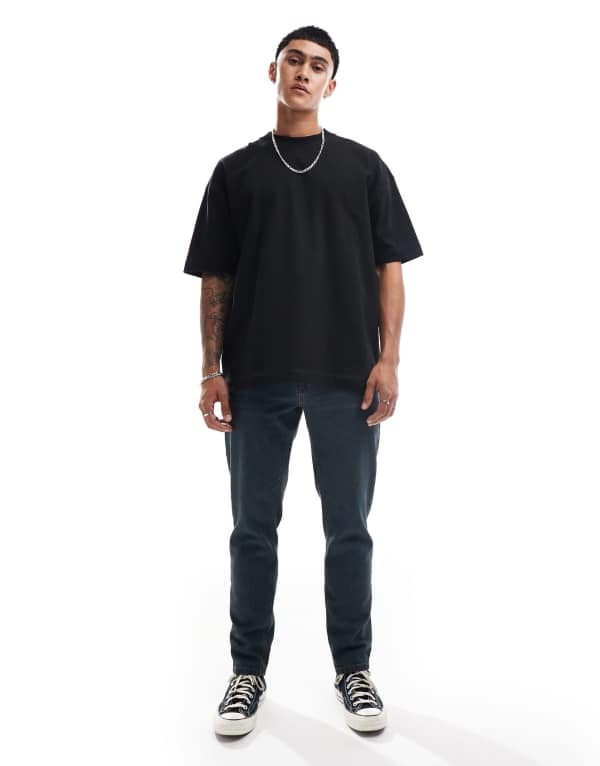 【送料無料】 エイソス メンズ デニムパンツ ボトムス ASOS DESIGN tapered fit jeans in washed gray with green tint Gray wash