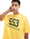 【送料無料】 エイソス メンズ Tシャツ トップス ASOS DESIGN boxy oversized T-shirt with street graphic in yellow Solar power