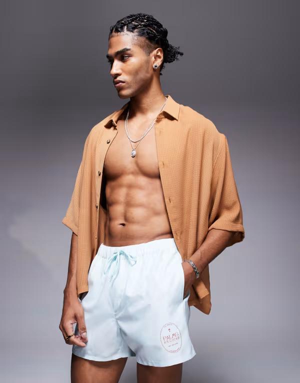 【送料無料】 エイソス メンズ ハーフパンツ・ショーツ 水着 ASOS DESIGN swim shorts in short length in blue and white stripe BLUE