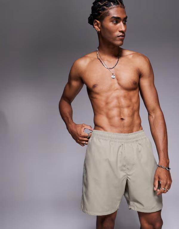 【送料無料】 エイソス メンズ ハーフパンツ・ショーツ 水着 ASOS DESIGN swim shorts in mid length in khaki Khaki