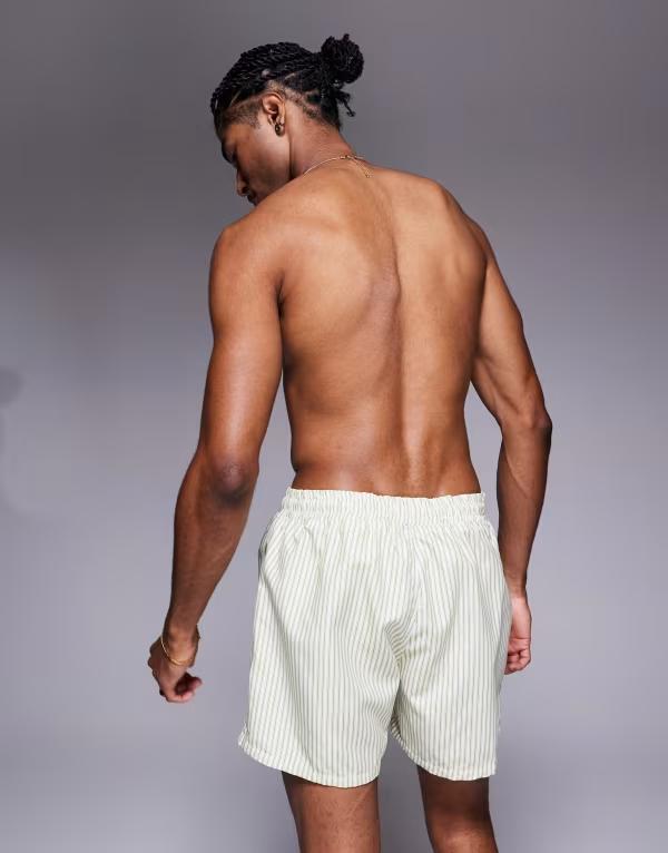 【送料無料】 エイソス メンズ ハーフパンツ・ショーツ 水着 ASOS DESIGN short length swim short in cream stripe CREAM