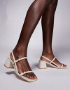 【送料無料】 パブリックデザイア レディース サンダル シューズ Public Desire Logan mid block heeled sandals in natural Cream