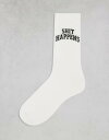 【送料無料】 エイソス メンズ 靴下 アンダーウェア ASOS DESIGN socks with Shit Happens artwork in white WHITE