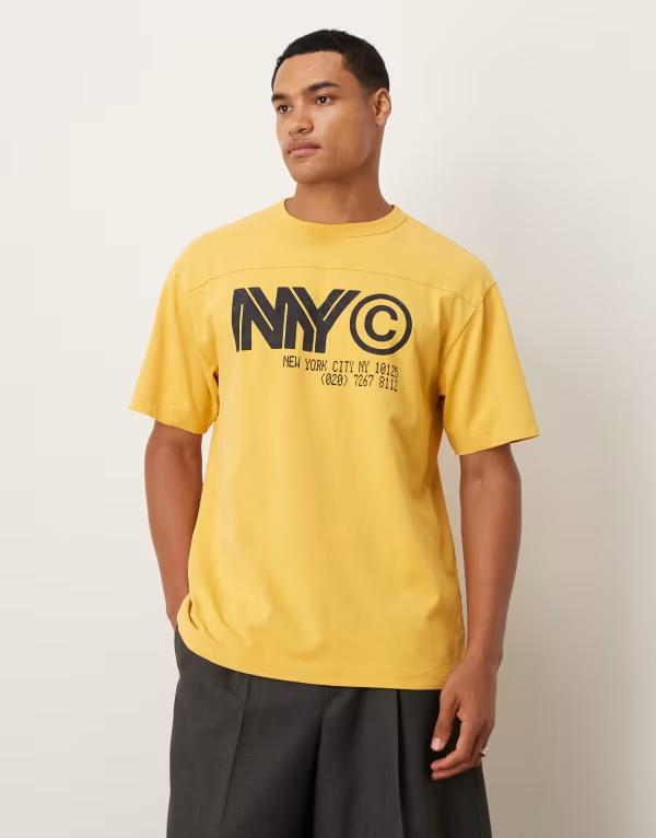 エイソス メンズ トップス Tシャツ グラフィック ASOS DESIGN heavyweight relaxed t-shirt with NYC graphic in washed yellow Solar power イエロー