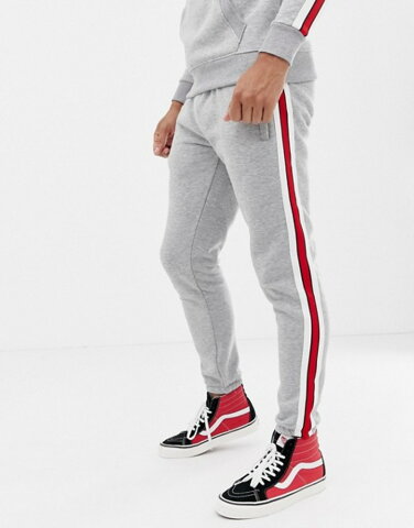 グッドフォーナッシング メンズ カジュアルパンツ ボトムス Good For Nothing joggers with side stripe in gray Grey