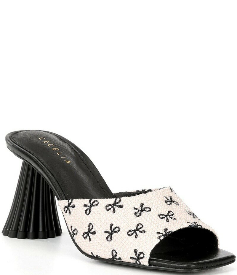 【送料無料】 セシリア ニューヨーク レディース サンダル シューズ Cadsbury Crystal Embellished Leather Bow Sculptural Heel Slide Sandals Oat/Black Bow