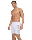 【送料無料】 カルバンクライン メンズ ハーフパンツ ショーツ 水着 Men 039 s Core Logo-Print 7 Volley Swim Trunks White