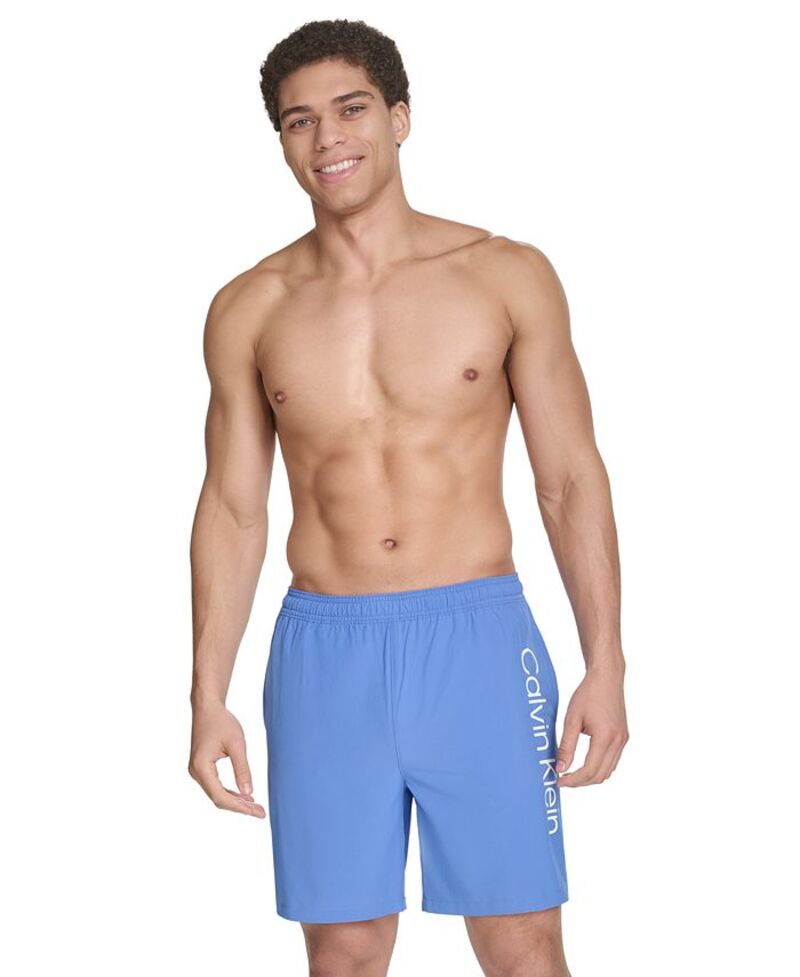 【送料無料】 カルバンクライン メンズ ハーフパンツ・ショーツ 水着 Men's Regular-Fit Quick-Dry 5" Swim Trunks with Compression Short Liner Medium Blue
