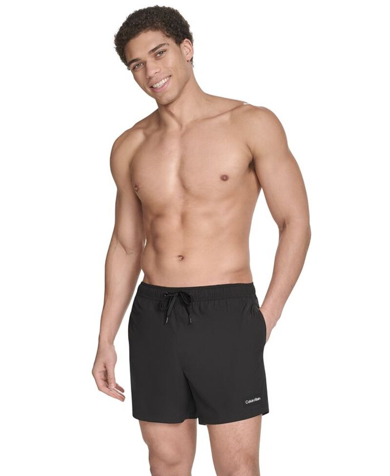 【送料無料】 カルバンクライン メンズ ハーフパンツ・ショーツ 水着 Men's Core Euro Regular-Fit Quick-Dry 5" Swim Trunks with Compression Short Liner Black