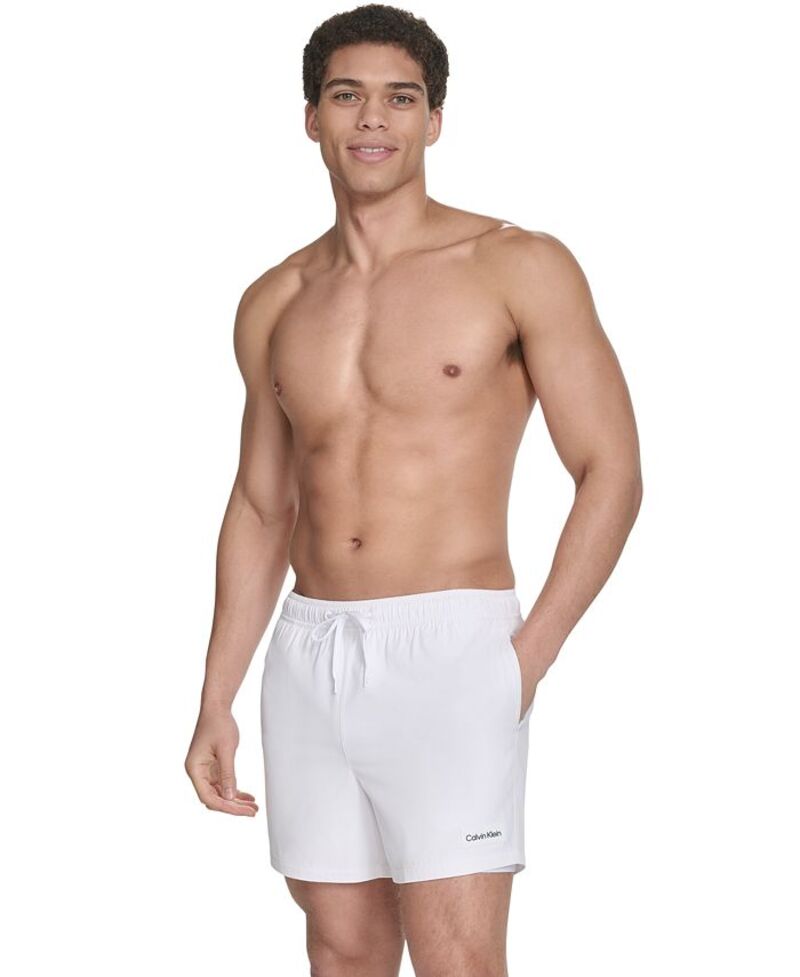 【送料無料】 カルバンクライン メンズ ハーフパンツ・ショーツ 水着 Men's Core Euro Regular-Fit Quick-Dry 5" Swim Trunks with Compression Short Liner White