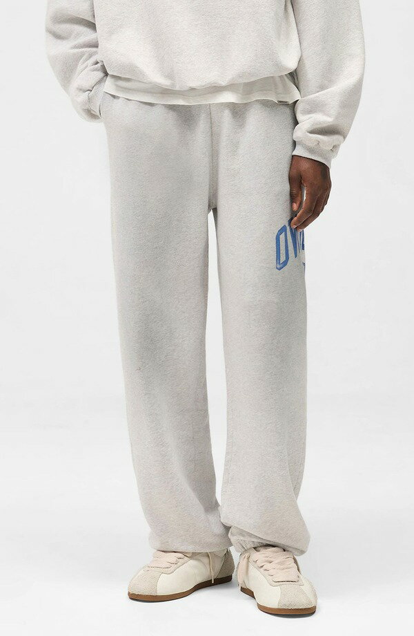 リプレゼント メンズ ボトムス カジュアルパンツ スウェットパンツ ロゴ グラフィック Represent Owners' Club Logo Graphic Sweatpantsprayed Ice Grey Marl グレー