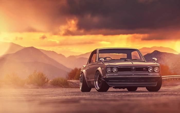 絵画風 壁紙ポスター (はがせるシール式) 日産 スカイライン 2000 GTX ハコスカ GT-R 夕焼け キャラクロ NGTX-003W2 (ワイド版 603mm×376mm) ＜日本製＞ ウォールステッカー お風呂ポスター