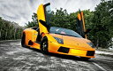 絵画風 壁紙ポスター (はがせるシール式) ランボルギーニ ムルシエラゴ LP640 オレンジ 2006年 スーパーカー キャラクロ LMCL-003W1 (ワイド版 921mm×576mm) <日本製> ウォールステッカー お風呂ポスター