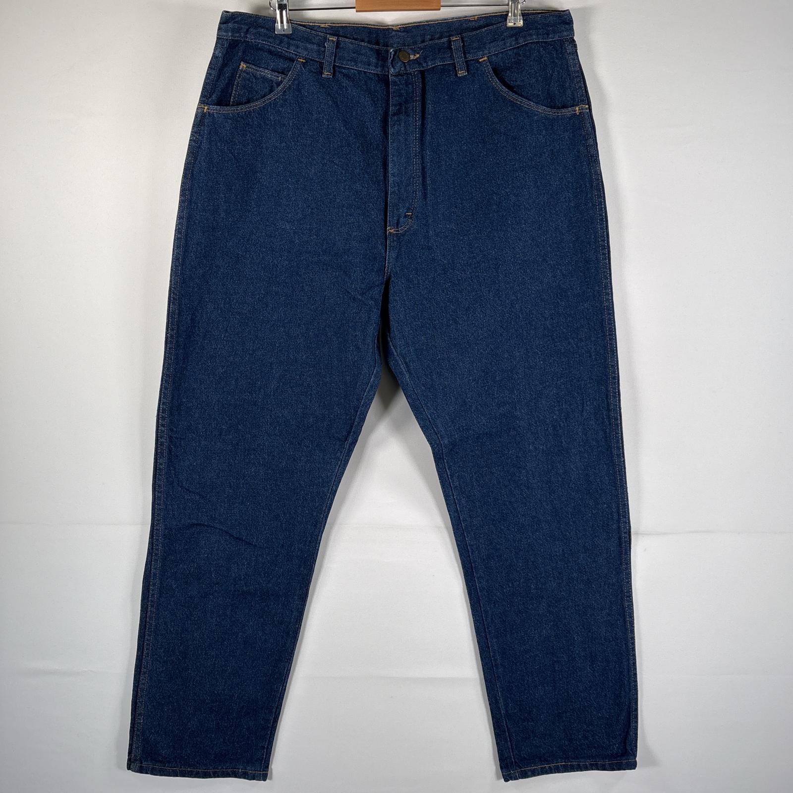 古着 ラングラー Wrangler USA製 デニムパンツ ブルーデニム ジーンズ ジーパン テーパード 大きいサイズ ワンポイントロゴ w42 L32 ブルー メンズ 【中古】